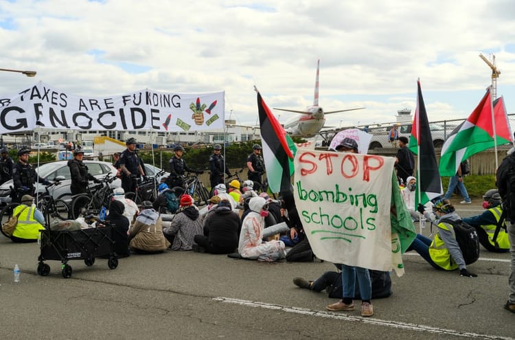 Palestine solidarity activists shut down Sea-Tac Airport road as part of global day of action