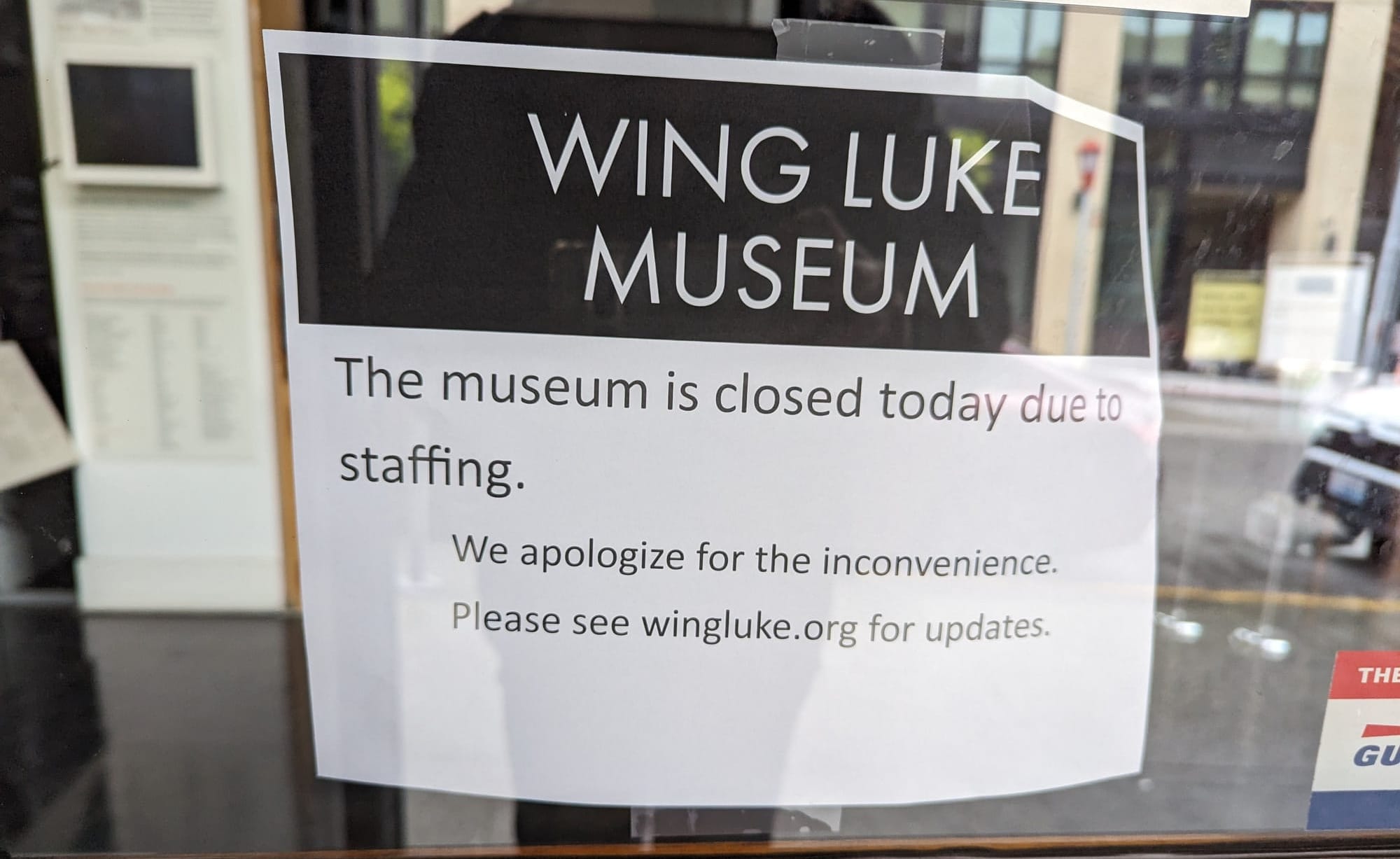 Sign saying the wing luke museum is closed due to staffing